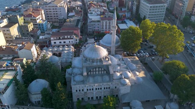 Istanbul, Turkey: A high-angle aerial drone shot of the historic Kilic Ali Pasa Mosque complex in the Tophane district.