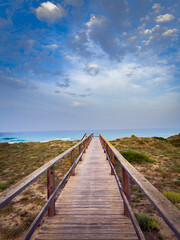 Naklejka premium Son bou beach wooden boardwalk approaching mediterranean sea.
