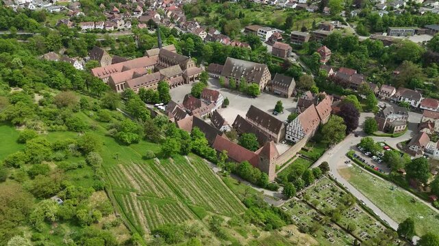 Famous Maulbronn Monastery in spring with medieval courtyard and half-timbered houses in Baden-Wuerttemberg, Germany