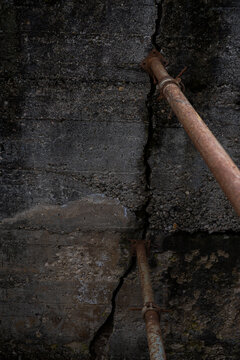 An old pipe laying on the ground