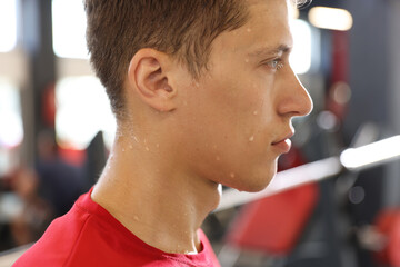 Tired man sweating after workout in gym © New Africa