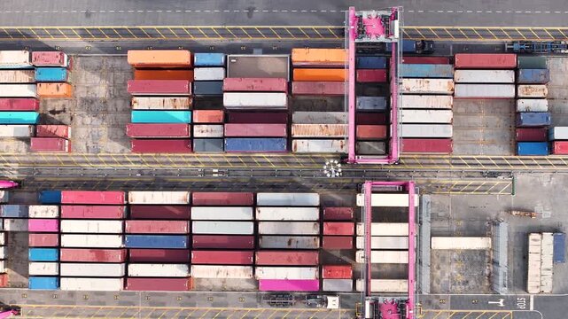 Exploring the busy operations of a major cargo terminal at a bustling shipping port