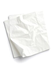 Obraz premium Two white, folded paper squares, a textured, disposable material, sit diagonally, lit from above, with shadow