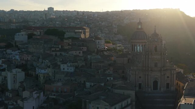 sunset flying counter clockwise view of historic Ragusa Sicily