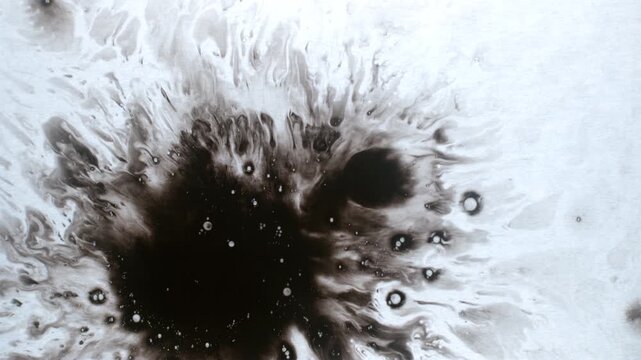 Abstract Ink Explosion Texture &ndash; Black Fluid Splash Spreading Motion