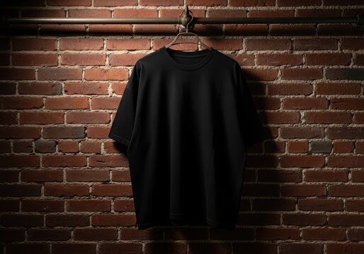 Black leather jacket hanging on rustic brick wall