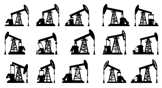 Old oil pumpjacks working in a field