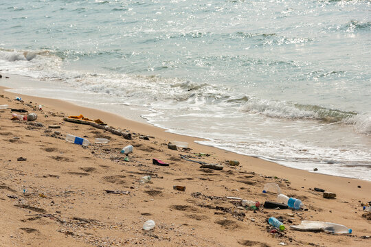 Plastic pollution, Many plastic debris on the beautiful tropical beach