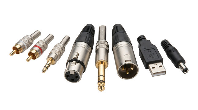 Assorted professional audio and data connectors including XLR, TRS, RCA, and USB plugs isolated on white for technology, multimedia hardware, and electronic connection concepts.