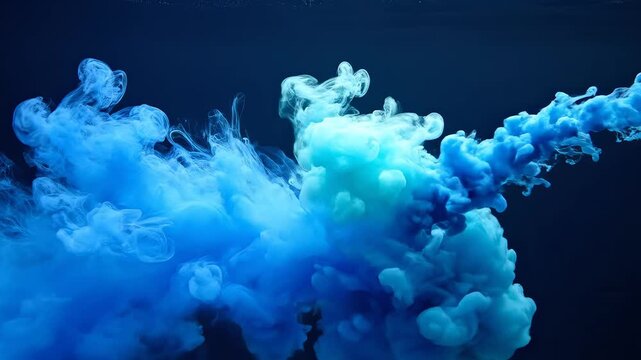 Blue ink cloud in dark liquid for creative digital media and visual arts