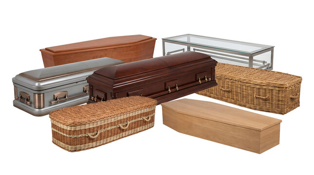 Selection of funeral coffins and caskets in wood, metal, wicker, and glass isolated on white. High-quality studio display for mortuary services, burial options, and end-of-life planning.