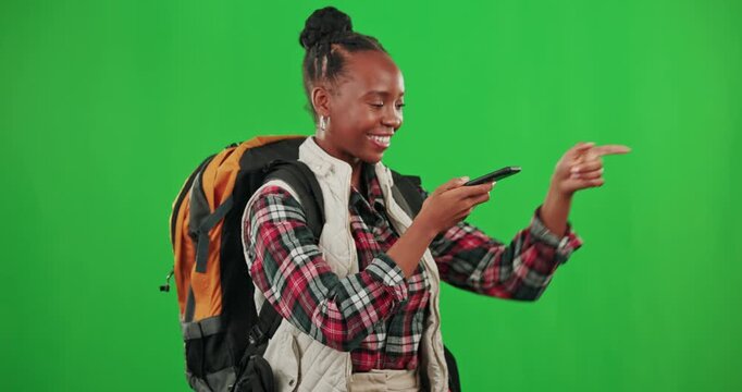Phone gps, green screen or black woman tourist searching for a location on digital map with studio background. Traveling compass, lost directions or confused African girl hiking on adventure journey
