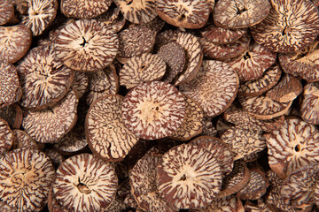 Obraz premium Sliced betel nut pieces creating texture background