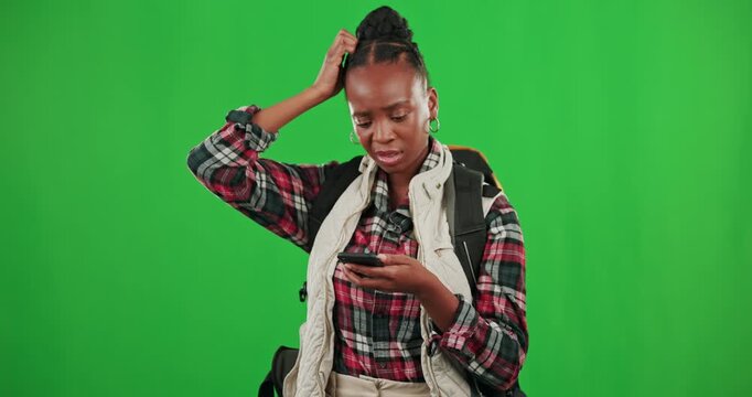 Phone, green screen or black woman tourist searching for map location on digital gps with studio background. Traveling compass, lost directions or confused African girl hiking on adventure journey