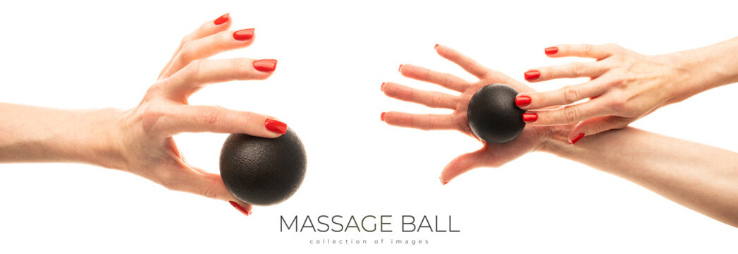 Massage black ball in female hand for trigger points isolated on a white background. Concept of myofascial release.
