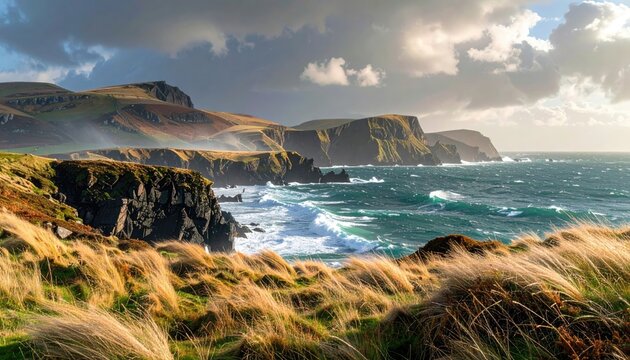 Sunlit, windswept coastline with dramatic cliffs, rolling hills, and crashing waves