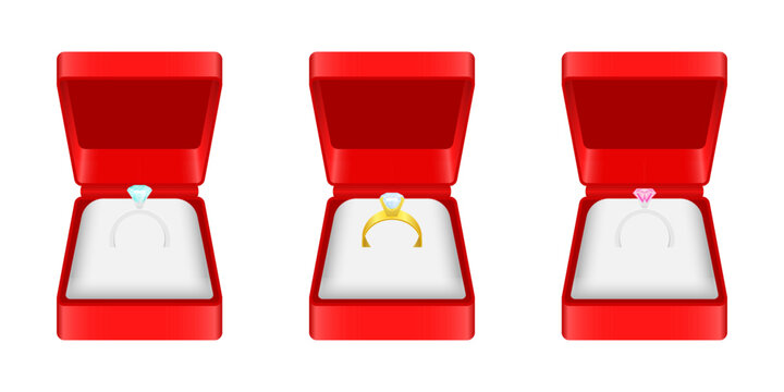 Three rings are presented in open red ring boxes with different gems.