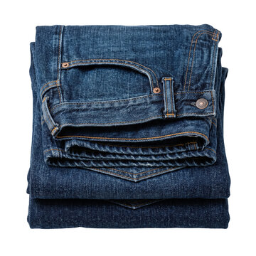 Stack of folded dark blue denim jeans pants