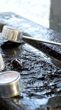 Japanese Shinto Ritual Water Purification Basin at Oyama Shrine in Kanazawa