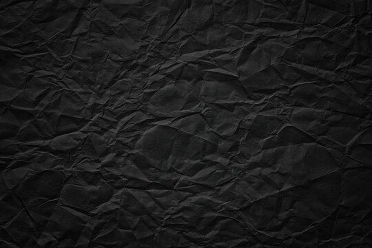 crumpled paper texture, black cardboard sheet, gloomy background
