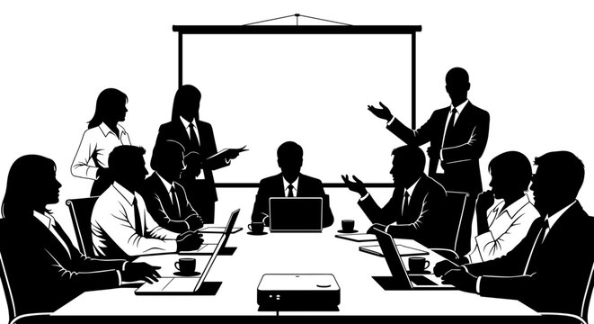 Diverse business team in silhouette collaborating around a conference table with laptops and projector screen
