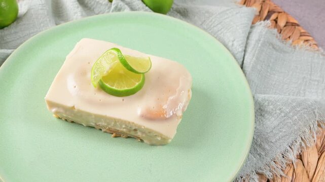Lime carlota, creamy citrus dessert with biscuits and condensed milk topping