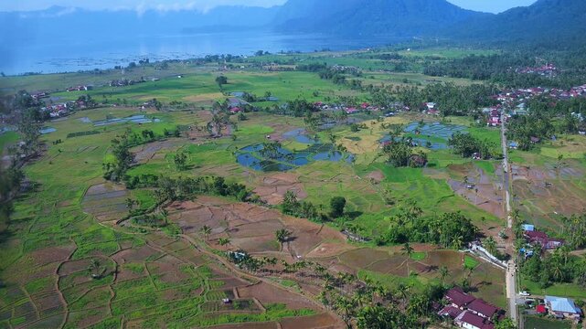 Agam Regency, West Sumatra, April 30, 2026: Aerial video of the condition of agricultural land that has been restored after the natural disaster of flash floods at the end of November 2025.