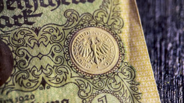 Macro Video of Imperial Eagle Emblem on Antique German Mark Banknote