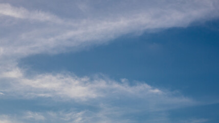 Fototapeta premium Wispy Clouds in Blue Sky