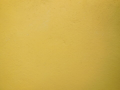 Cool yellow wall to be used as background.