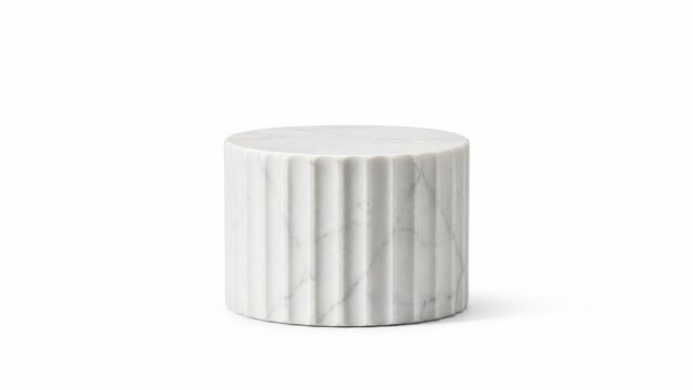 Short perfectly cut cylinder section of a classic Greek marble column featuring elegant carved vertical lines serving as a minimalist display plinth smooth pristine white stone