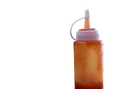Nearly Empty Plastic Ketchup Sauce Bottle Isolated on Transparent Background with Copy Space