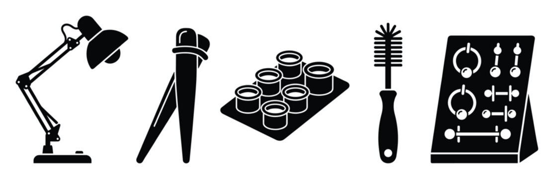 Desk lamp, chopsticks, ink cups, brush, and piercing display icons for various designs