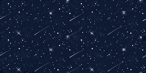 Seamless pattern of stars and shooting stars on a deep blue night sky background © Bebdas