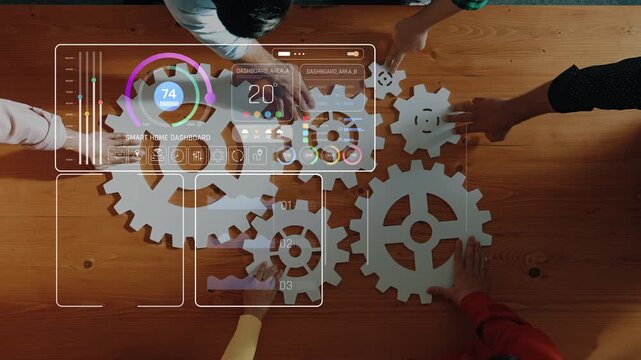 A diverse group of professionals engage in a data analysis session, utilizing an interactive dashboard with gears, showcasing effortless teamwork and modern technology. Raster