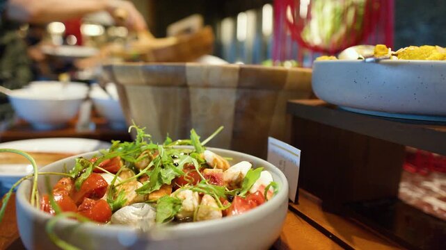 Fresh Caprese Salad with Mozzarella and Cherry Tomatoes at Buffet