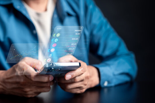 Stock market portfolio growth selection and trading analysis solution. Man using smartphone with glowing hologram financial data chart and business strategy.