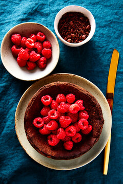 Chocolate Basque Cheesecake with Raspberries and Chocolate Curls From Above