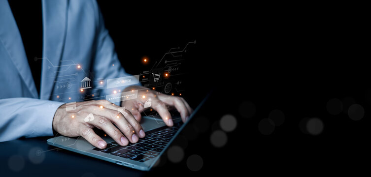 Businessman typing on laptop with digital login interface representing cybersecurity online banking data protection authentication, fintech secure network access in modern digital business environment