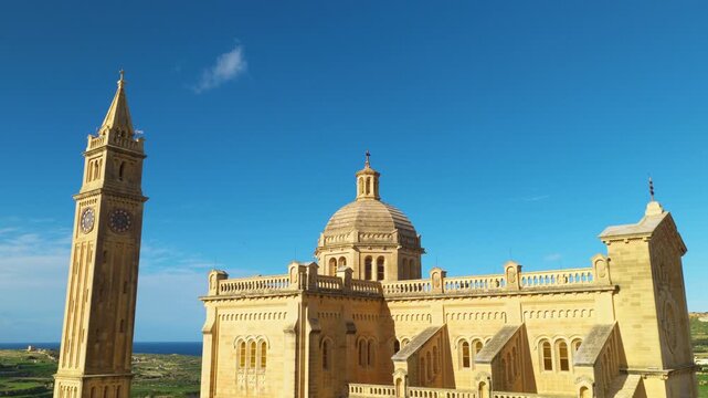 Basilica of the National Shrine of the Blessed Virgin of Ta' Pinu Near Gharb On The Island Of Gozo In Malta. Aerial Drone Shot
