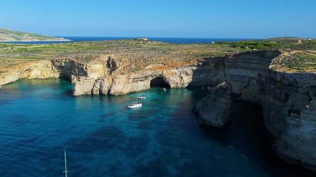 Luxury Boats Sailing Near Comino Islands In Blue Lagoon, Malta. Aerial Drone Shot