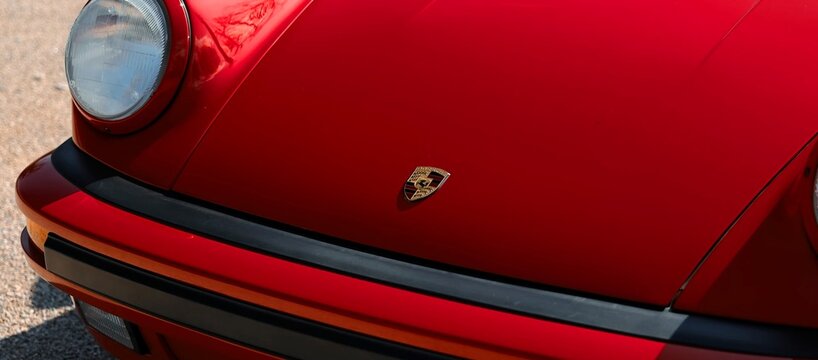 1988 Porsche 911 Speedster, Legend, red retro sports car.