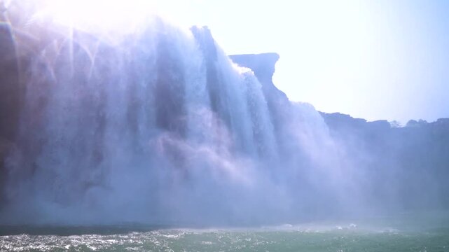 Powerful waterfall landscape at Chitrakote Falls surrounded by nature.