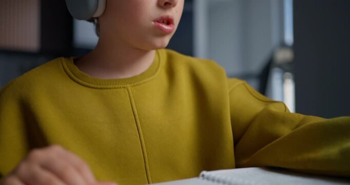 Child Immersed In Artistic Thinking At Home. Young Boy Deep In Thoughtful Moment With Art Tools Nearby
