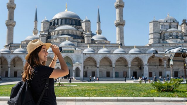 Woman Exploring Historic Mosque: A traveler gazes in awe at a majestic mosque, the intricate architecture a testament to time and culture. In a sun-drenched scene.