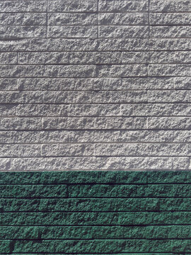 Painted Cinder Block Wall with White Top and Green Bottom, Rough Texture