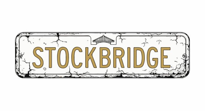 Cracked, aged license plate with "STOCKBRIDGE" text and bridge graphic