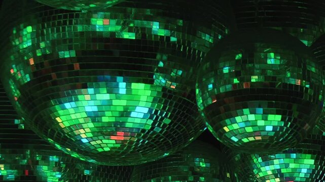 A dazzling birthday bash unfolds at a vibrant disco club. The air sparkles with the reflections of countless lights bouncing off mirrored spheres, setting a joyful mood for a memorable night.