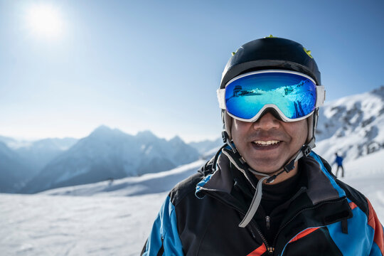 Man wearing ski googles at Scuol winter sport area