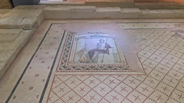 Stunning 4K cinematic close-up of the Tyche of Zeugma mosaic. A Roman masterpiece depicting the city's personification with a mural crown and scepter in Gaziantep Museum.